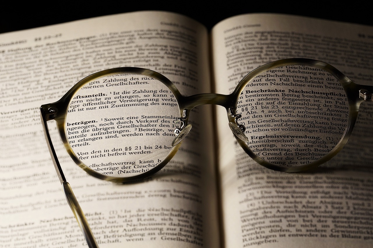 Symbolic picture of eyeglasses on a book.
